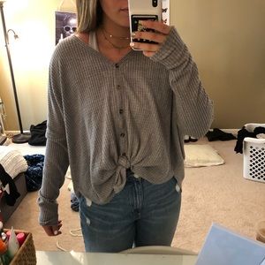 Gray button up sweater